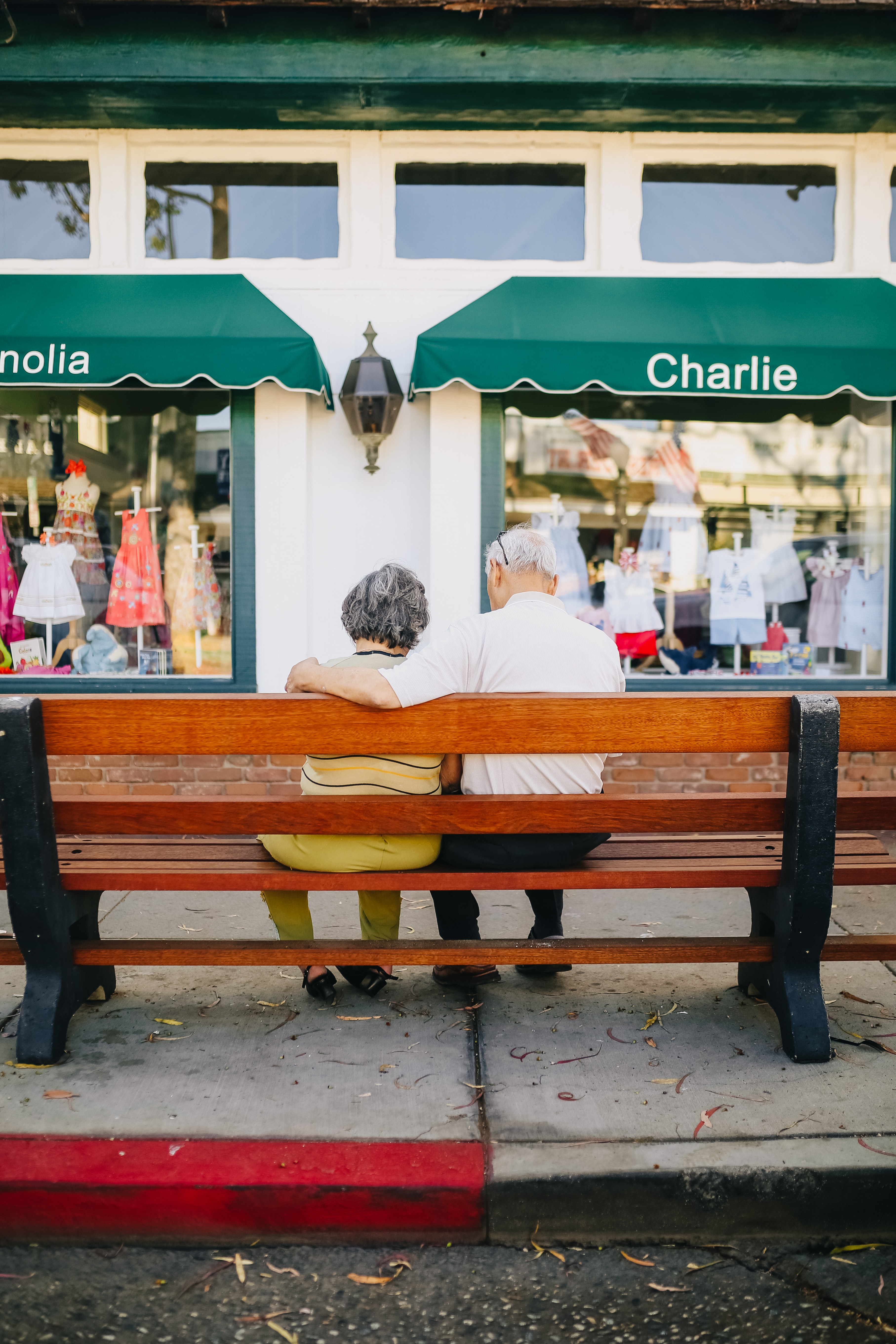 Elderly couple sitting together